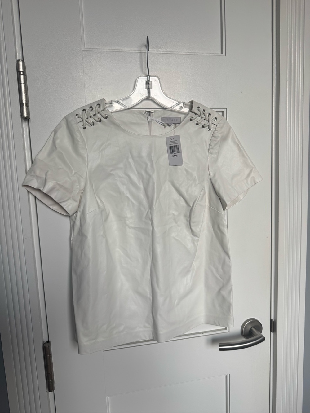 1.STATE Cloud White Faux Leather Short Sleeve Top with Lace-Up Shoulders